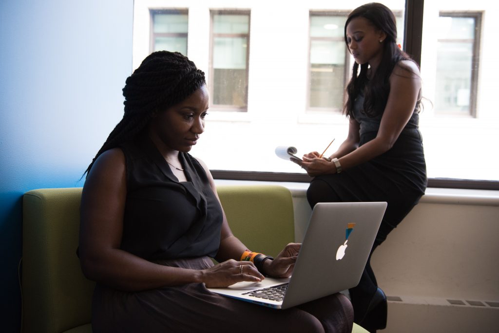 Women working on laptops
